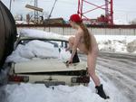 Alena B - "Cleaning snow off a car"